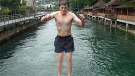 Ash does another back flip into the river
